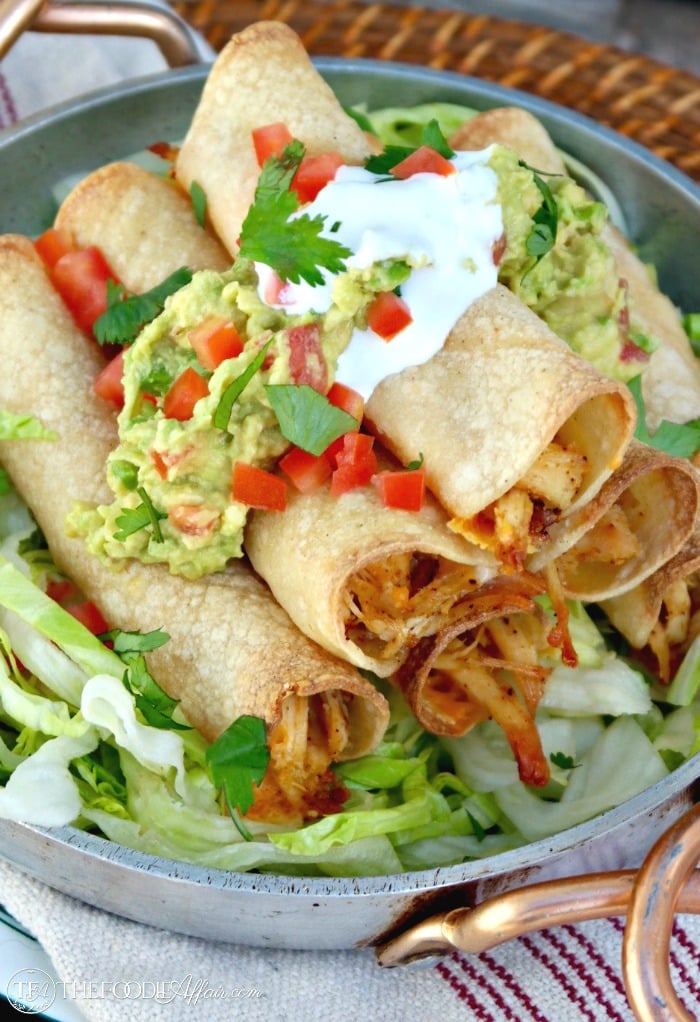 Make baked chicken taquitos using rotisserie chicken for a quick and delicious dinner!